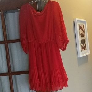 Cute red dress with pleating
